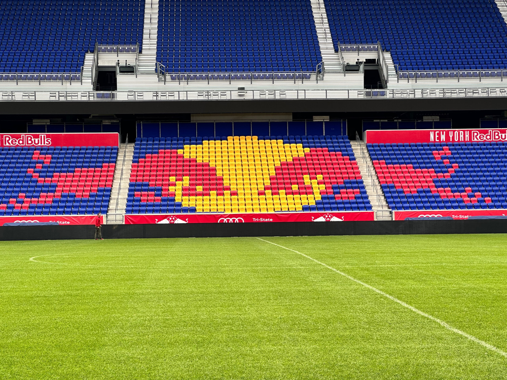 Red Bull Arena view cross field at midfield. You can see the dueling bulls in the seats.