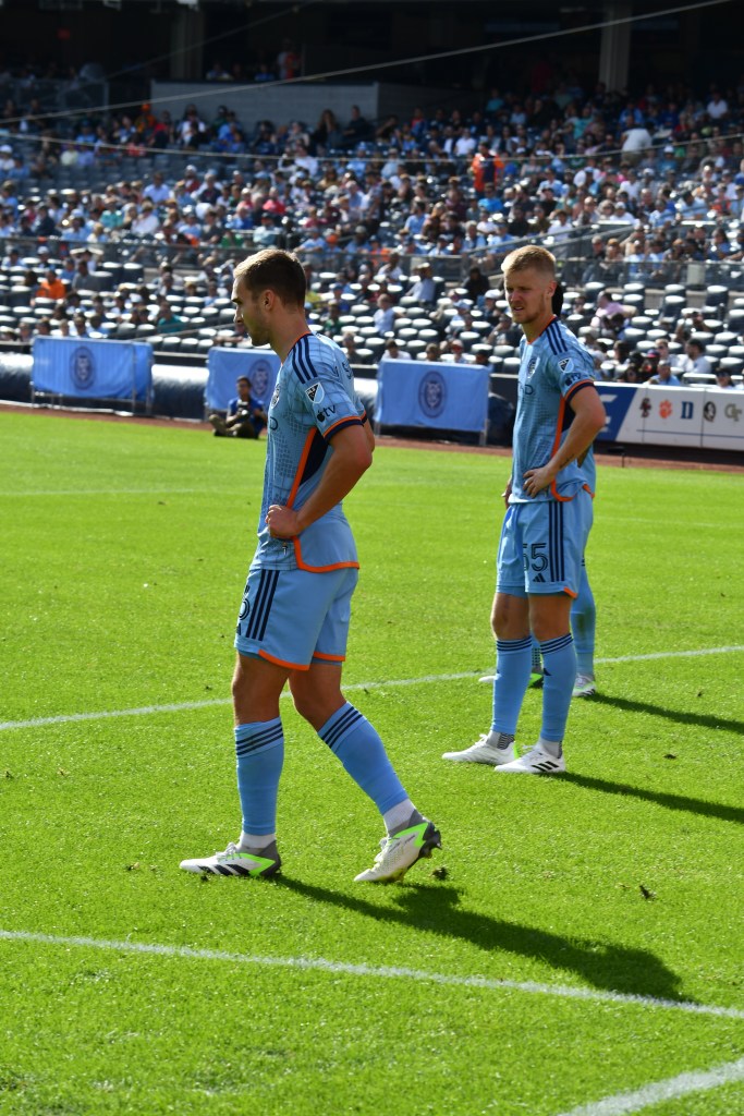 Keaton Parks and NYCFC teammate during stoppage in play at Yankee Stadium. Credit: Bad Dawg Sports/Sean McCaffery