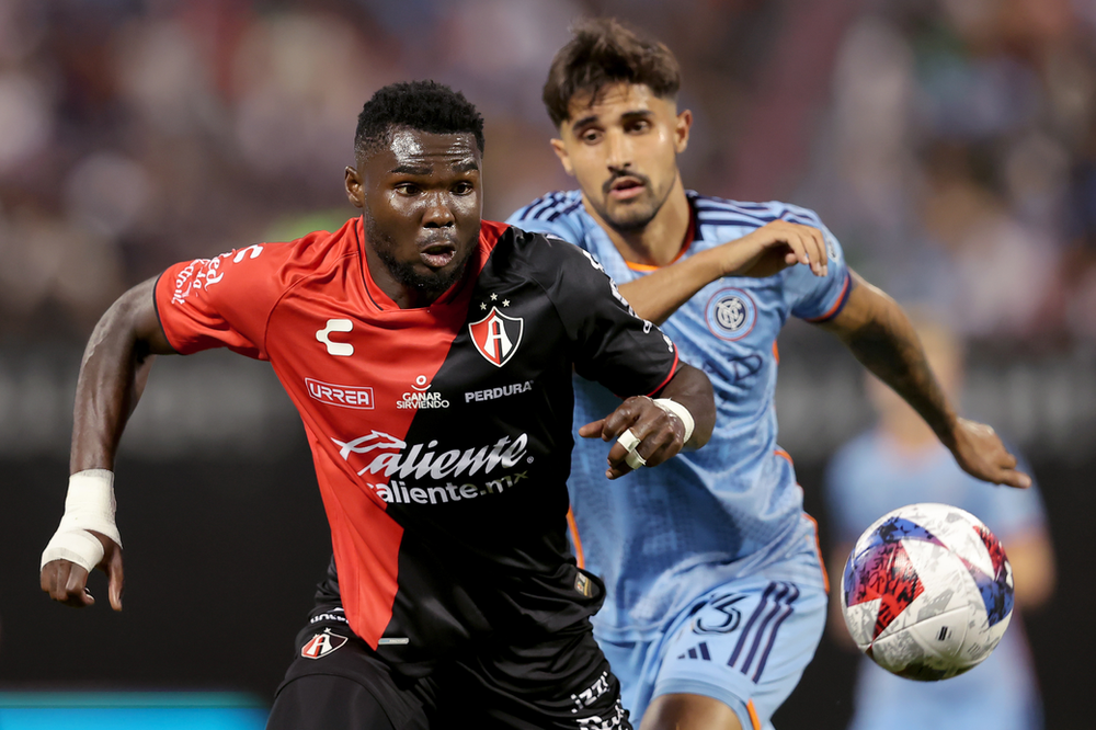 Jul 23, 2023; Queens, NY, USA; Atlas FC midfielder Jordy Caicedo (23) fights for the ball against New York City FC defender Thiago Martins (13) during the second half at Citi Field. Photo Credit: Brad Penner-USA TODAY Sports
