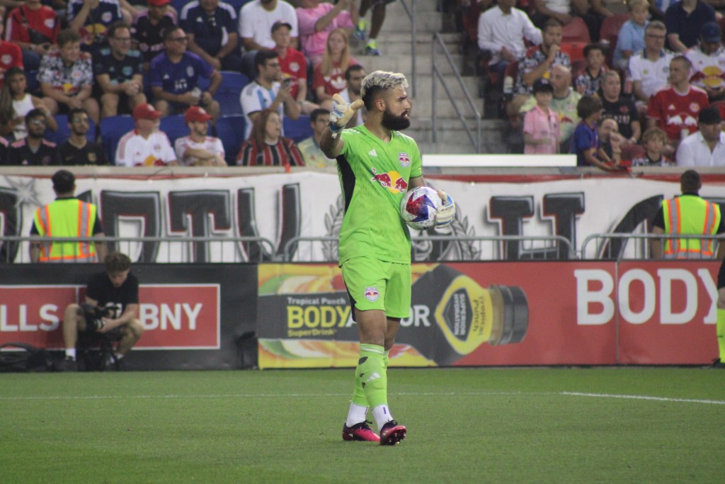 New York Red Bulls Carlos Coronel giving teammates instruction.