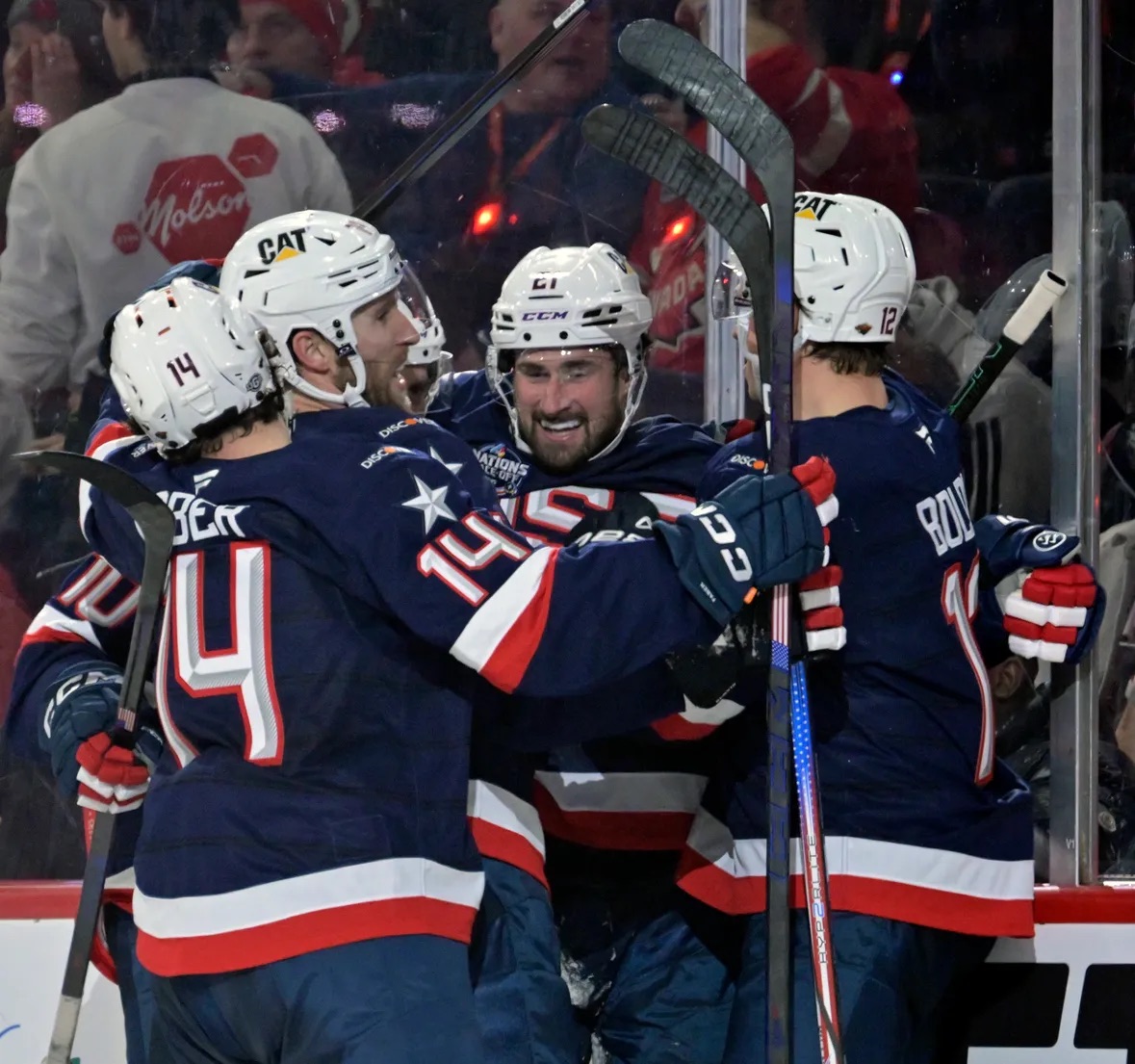 2/15/25 Montreal, CN Bell Centre| Team USA's Dylan Larkin (21) celebrates with teammates after scoring a goal in a 3-1 win against Team Canada. Mandatory Credit: Eric Bolte, Imagn Images