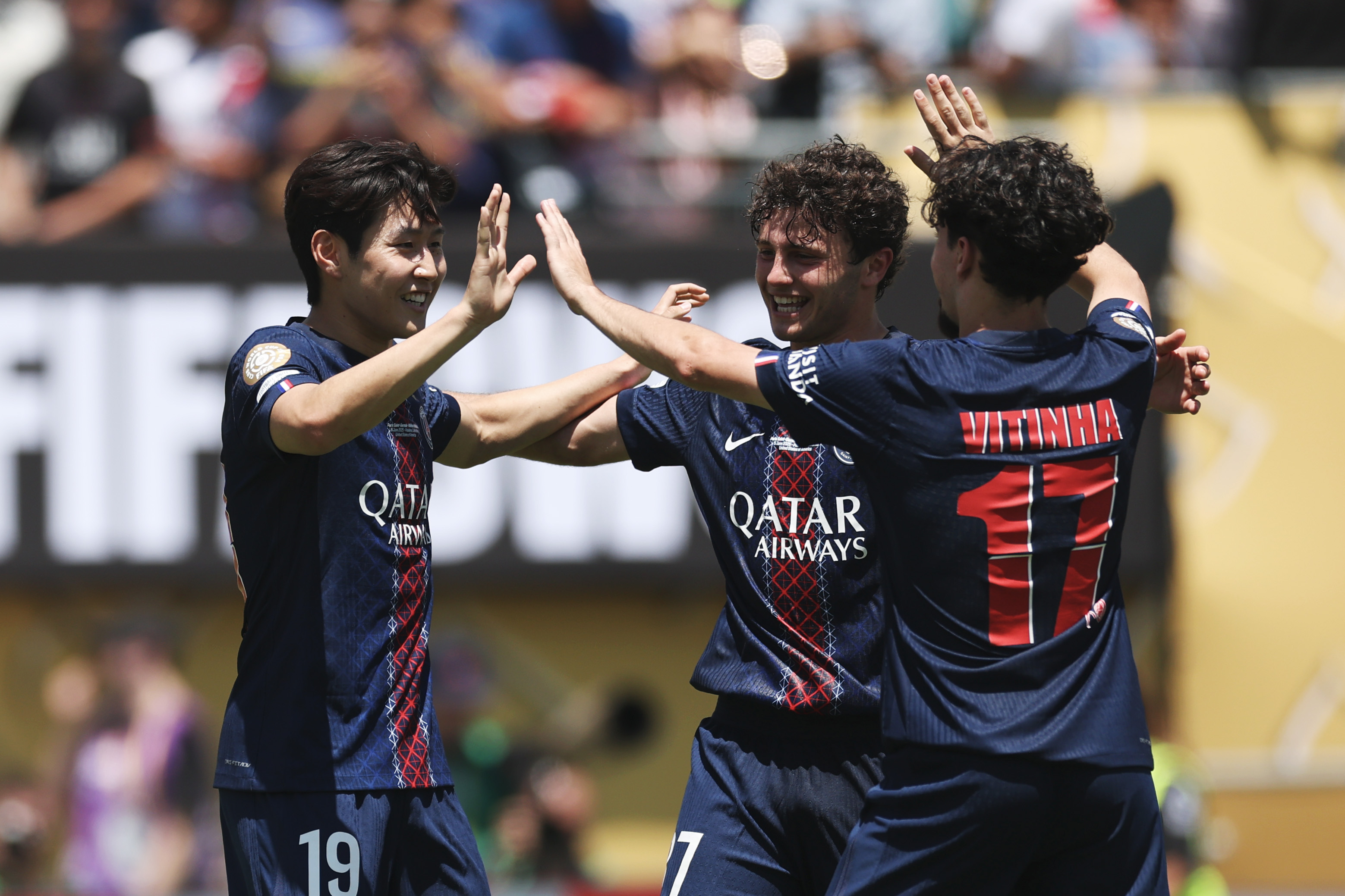 PASADENA, CALIFORNIA - JUNE 15: Vitinha #17, Lee Kang-in #19 and Joao Neves #87 of Paris Saint-Germain celebrate following the team's victory in the FIFA Club World Cup 2025 group B match between Paris Saint-Germain FC and Club Atletico de Madrid at Rose Bowl Stadium on June 15, 2025 in Pasadena, California. (Photo by Sean M. Haffey - FIFA/FIFA via Getty Images)