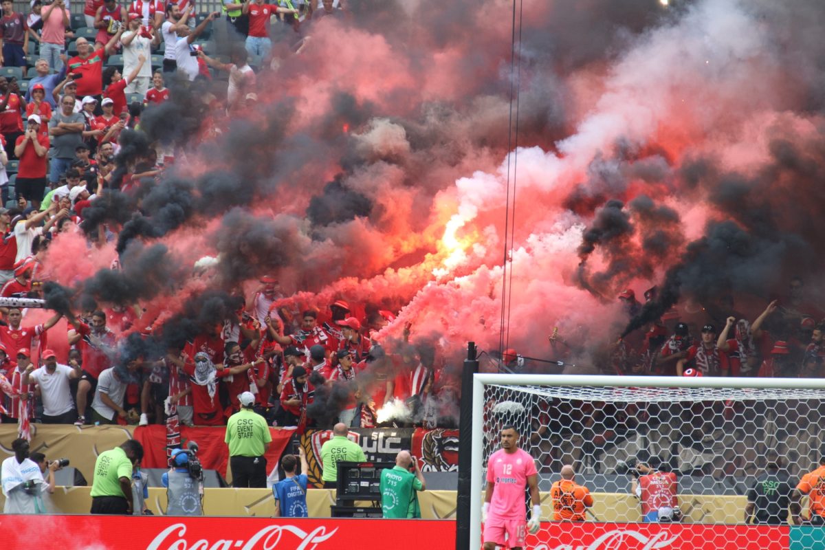 6/22/25, Philadelphia, Pennsylvania, Lincoln Financial Field, The Ultras Winners of Wydad AC lit up the stands with flares and smoke during their FIFA Club World Cup 2025 clash against Juventus FC. Jose Pichirilo /Bad Dawg Sports