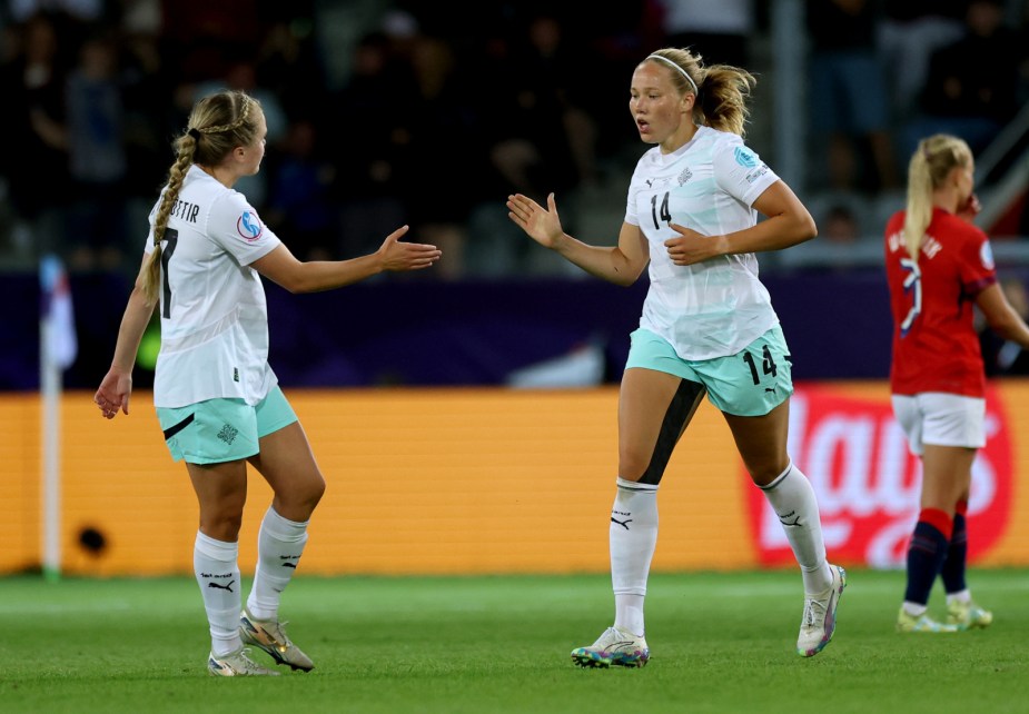 THUN, SWITZERLAND - JULY 10: Hlin Eiriksdottir of Iceland celebrates with teammate Agla Maria Albertsdottir after scoring her team's second goal during the UEFA Women's EURO 2025 Group A match between Norway and Iceland at Arena Thun on July 10, 2025 in Thun, Switzerland. (Photo by Maja Hitij - UEFA/UEFA via Getty Images)