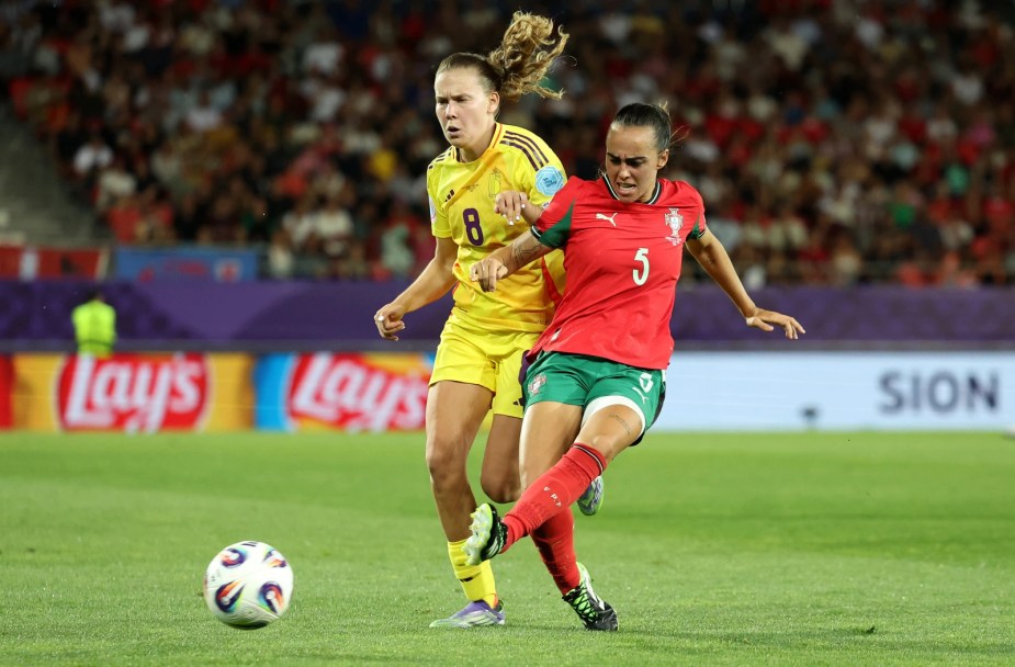 SION, SWITZERLAND - JULY 11: Joana Marchao of Portugal passes the ball under pressure from Jarne Teulings of Belgium during the UEFA Women's EURO 2025 Group B match between Portugal and Belgium at Stade de Tourbillon on July 11, 2025 in Sion, Switzerland. (Photo by Charlotte Wilson - UEFA/UEFA via Getty Images)