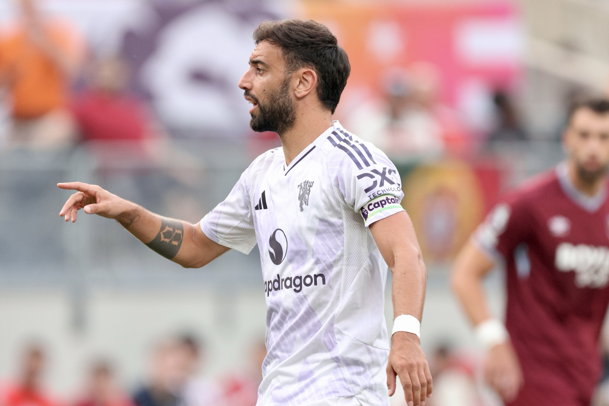 7/26/25, East Rutherford, New Jersey, MetLife Stadium. Bruno Fernandes of Manchester United looks on during the first half of the match against West Ham United. Jose Pichirilo /Bad Dawg Sports