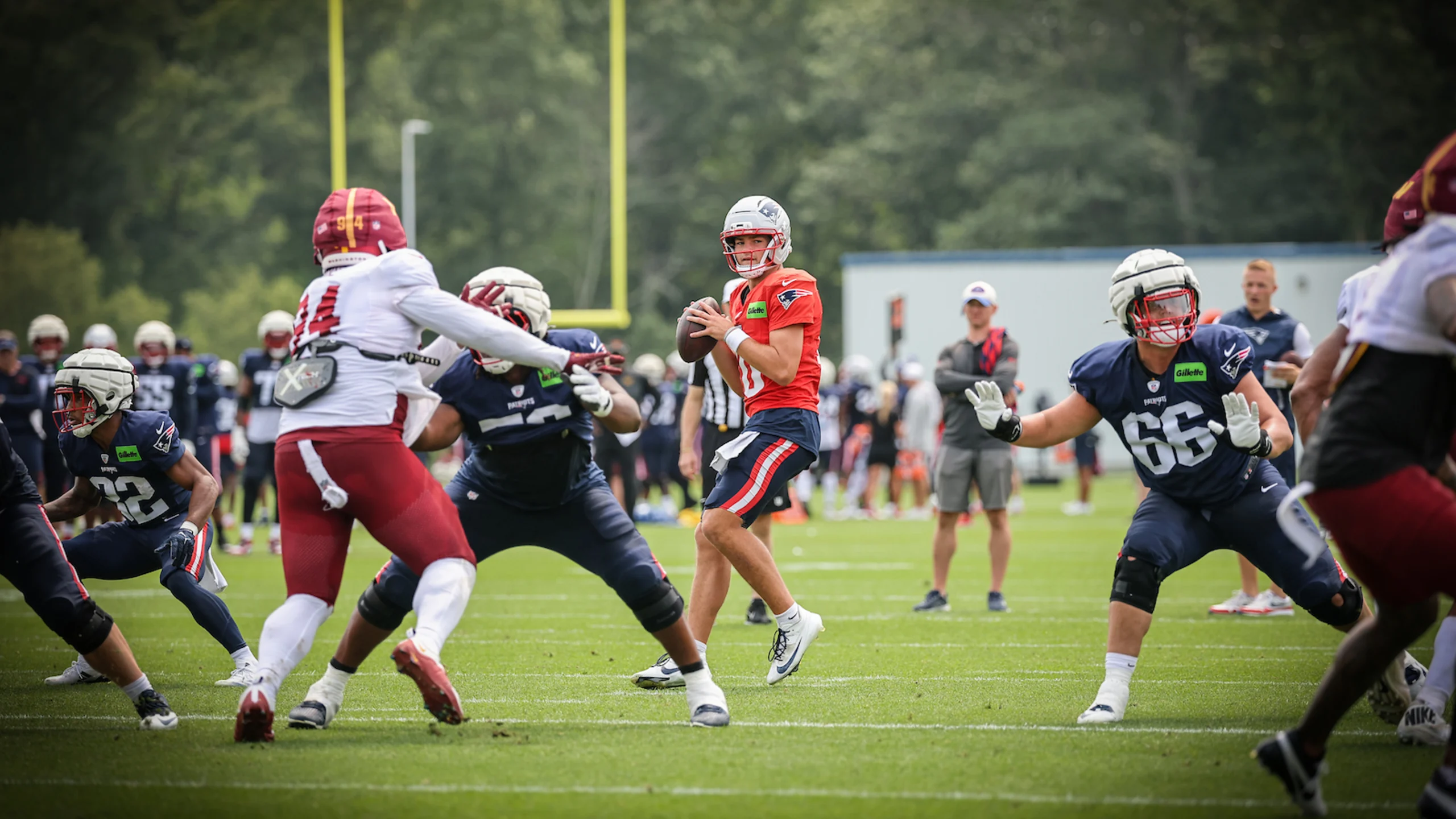 Patriots quarterback Drake Maye (10) drops back to pass during a joint practice with the Washington Commanders on Wednesday, August 6, 2025.