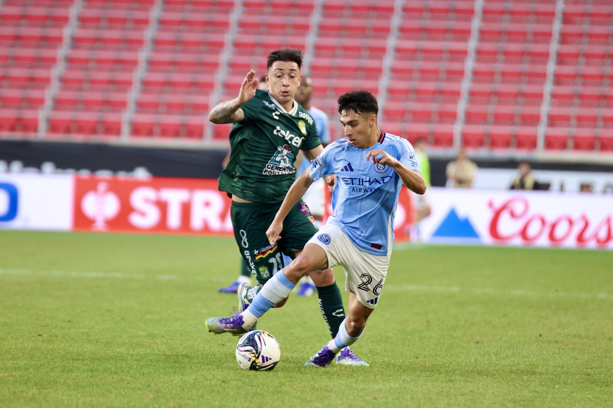 8/01/25, Harrison, New Jersey, Sports iIlustrated Stadium. Agustín Ojeda #26 of New York City FC dribbles past defenders during the second half of the Leagues Cup match against Club León. Jose Pichirilo. Bad Dawg Sports.