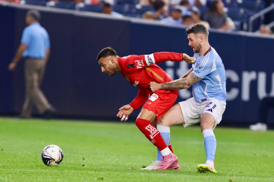8/5/25, Bronx, New York City, Yankees Stadium, Alexis Vega #9 of Toluca controls the ball past Aiden O’Neill #21 of New York City FC during first-half action in the Leagues Cup. Mandatory Credit: Jose Pichirilo/Bad Dawg Sports