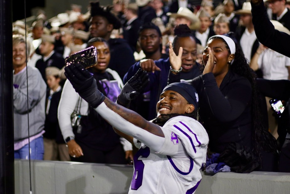 8/28/25, West Point, New York, Michie Stadium, AJ Owens (16), linebacker for Tarleton State, celebrates with fans in the stands with a selfie following the win against Army. Mandatory Credit: Jose Pichirilo/Bad Dawg Sports