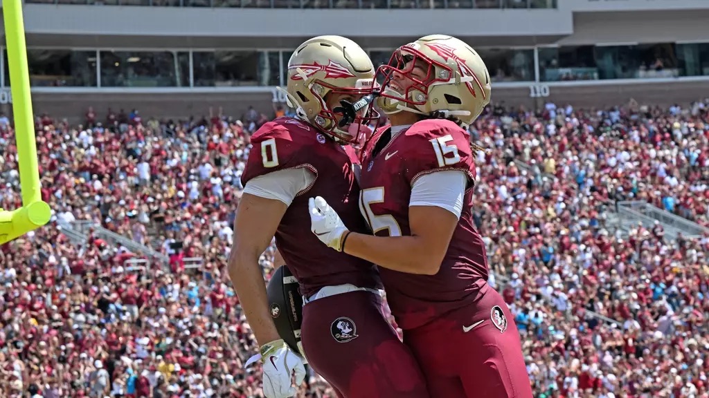 FSU wide receivers Duce Robinson (#0) and Jayvan Boggs (#15) celebrate touchdown in end zone during 77-3 victory over East Texas A&M at Doak Campbell Stadium