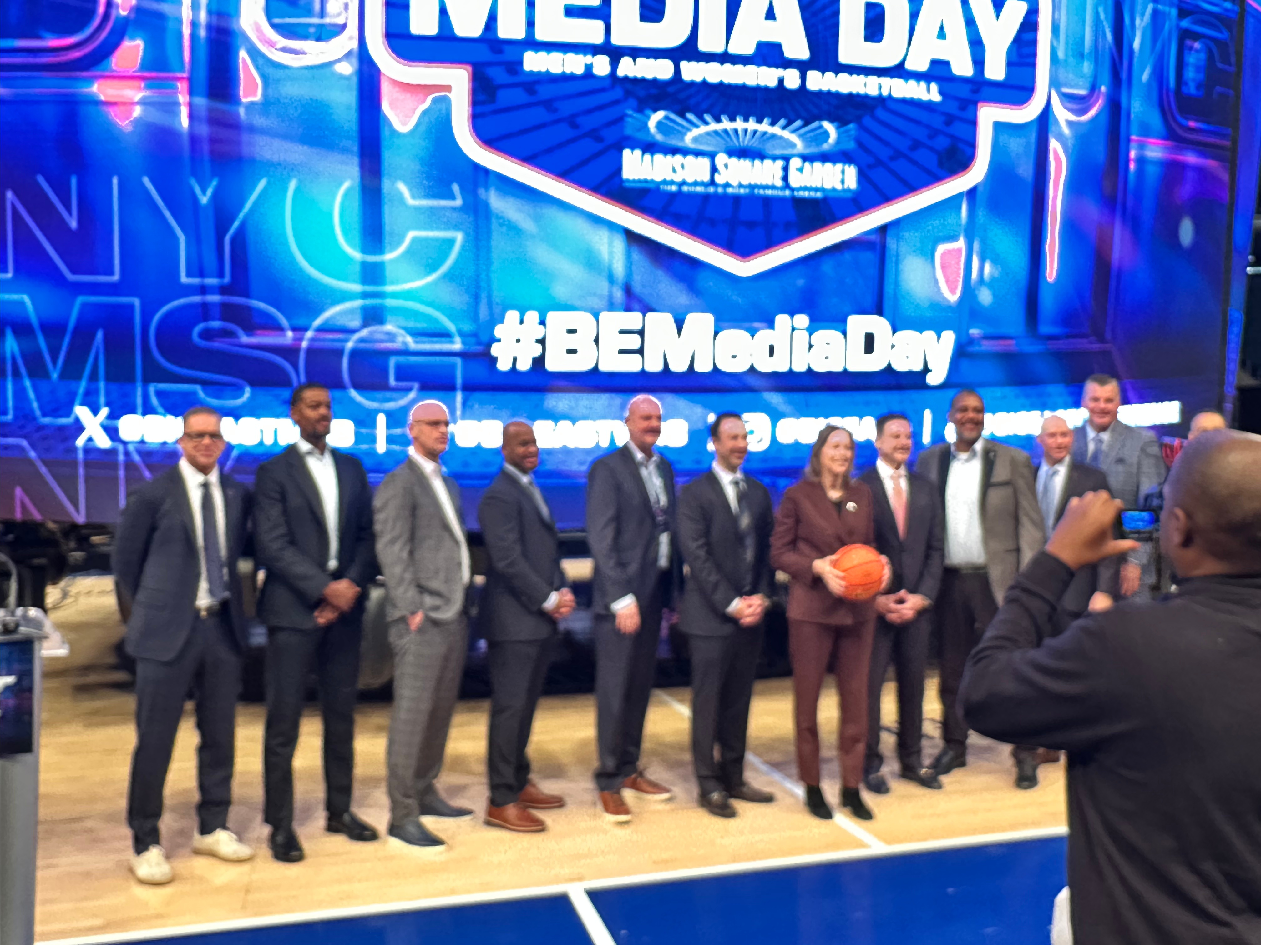 Big East Commissioner Val Ackerman poses with conference men's basketball head coaches and Madison Square Garden executive at 2025 Big East Media Day in New York City
