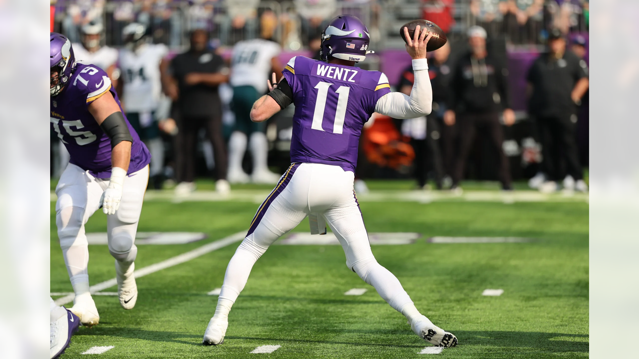Carson Wentz of the Minnesota Vikings drops back to pass against the Philadelphia Eagles at U.S. Bank Stadium in Minneapolis, MN on October 19, 2025.