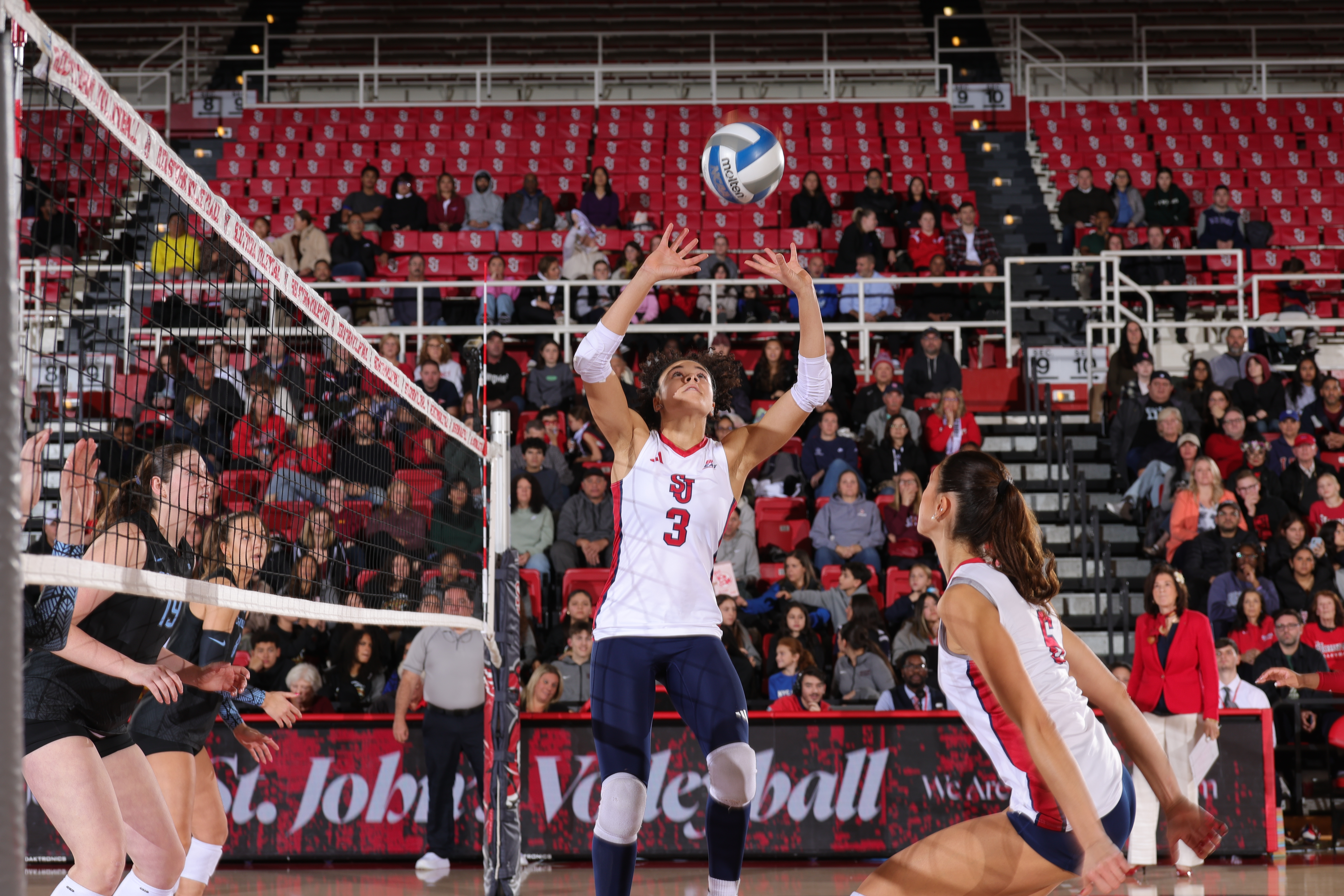Erin Jones number 3 of St. John's Red Storm women's volleyball sets the ball during a match against Creighton University at Carnesecca Arena