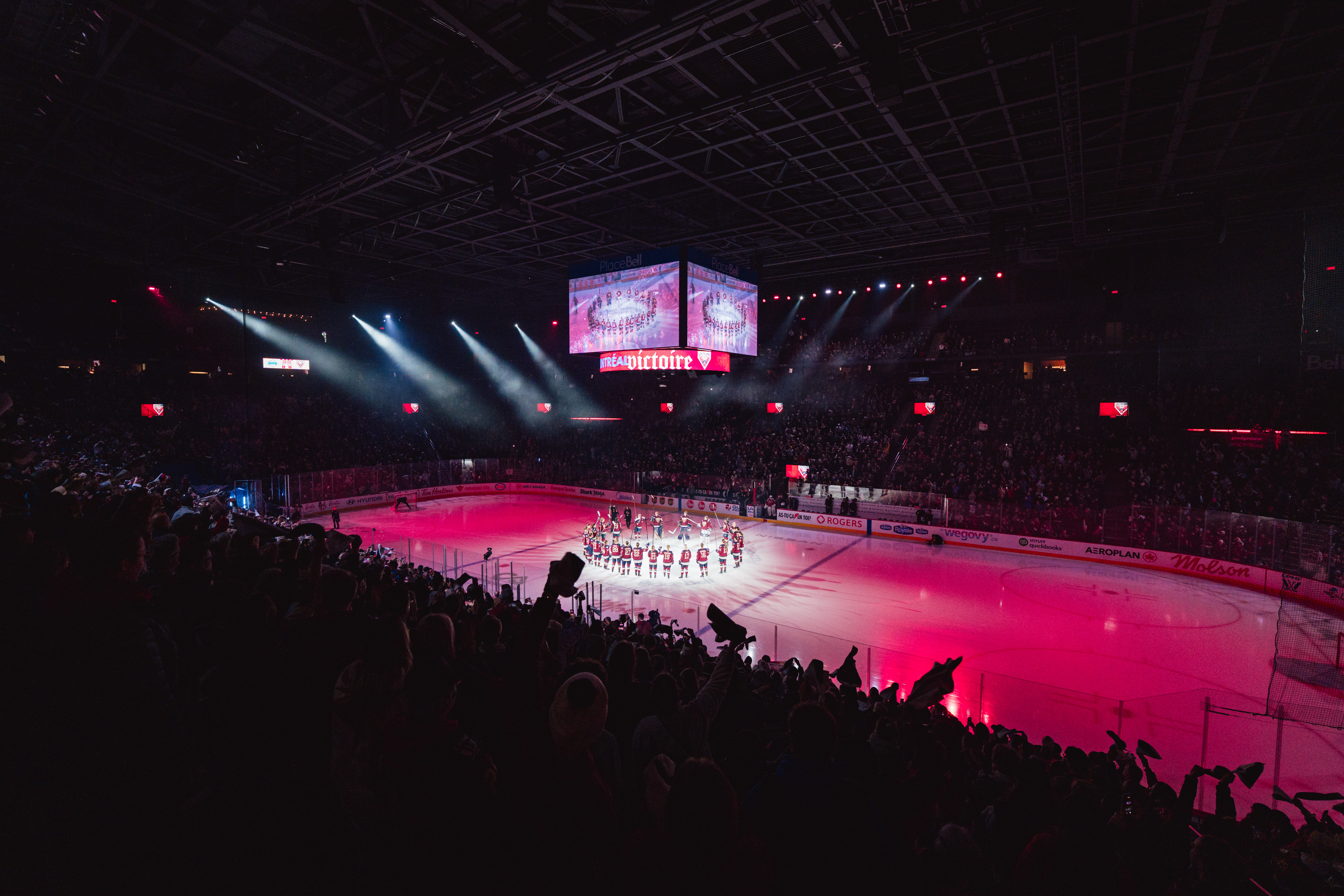 Montréal Victoire players line up at center ice for post-game salute to fans after 4-0 shutout victory over New York Sirens at Place Bell, Laval, Quebec, November 25, 2025