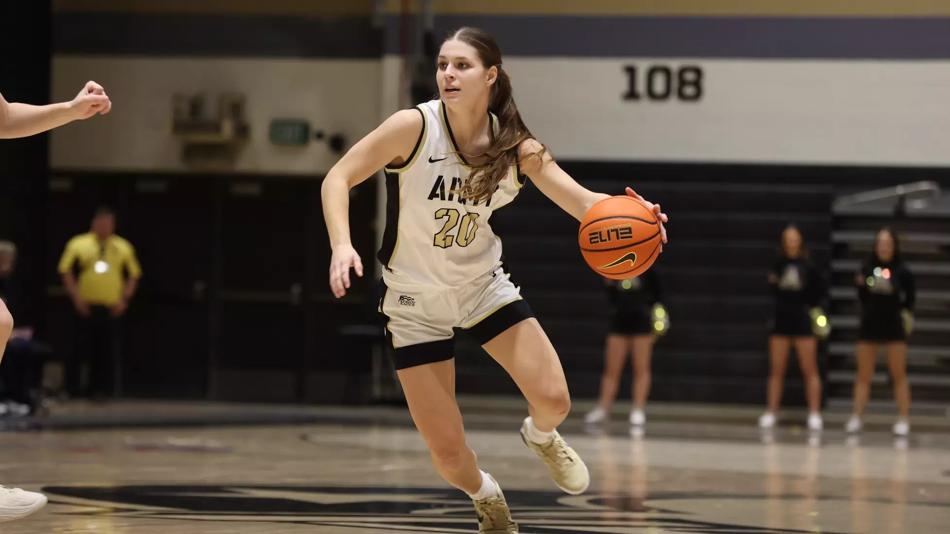 Army Black Knights junior guard Camryn Tade (20) drives to the basket during women's basketball game at Christl Arena