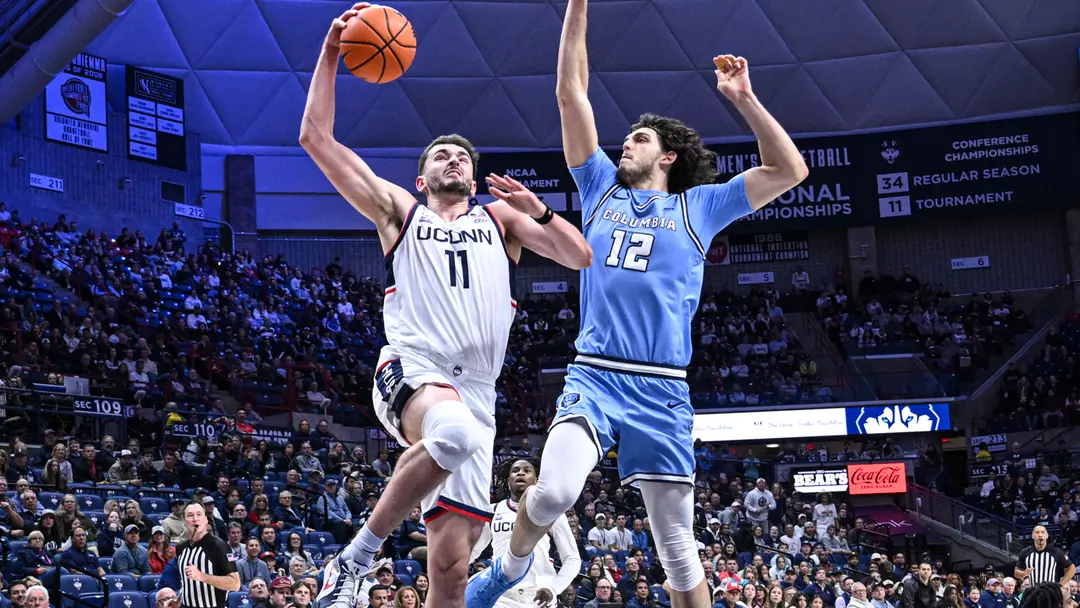 UConn Huskies redshirt senior forward Alex Karaban dunks the basketball during the team's 89-62 victory over Columbia on November 10, 2025, at Gampel Pavilion in Storrs, Connecticut.