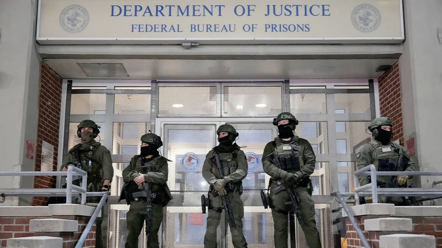 Federal law enforcement officers in tactical gear stand guard outside the Metropolitan Detention Center in New York, awaiting the arrival of Nicolás Maduro on January 3, 2026.