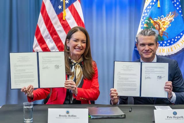 Secretary of War Pete Hegseth and Agriculture Secretary Brooke Rollins sign a memorandum of understanding in Washington on Feb. 11, 2026.