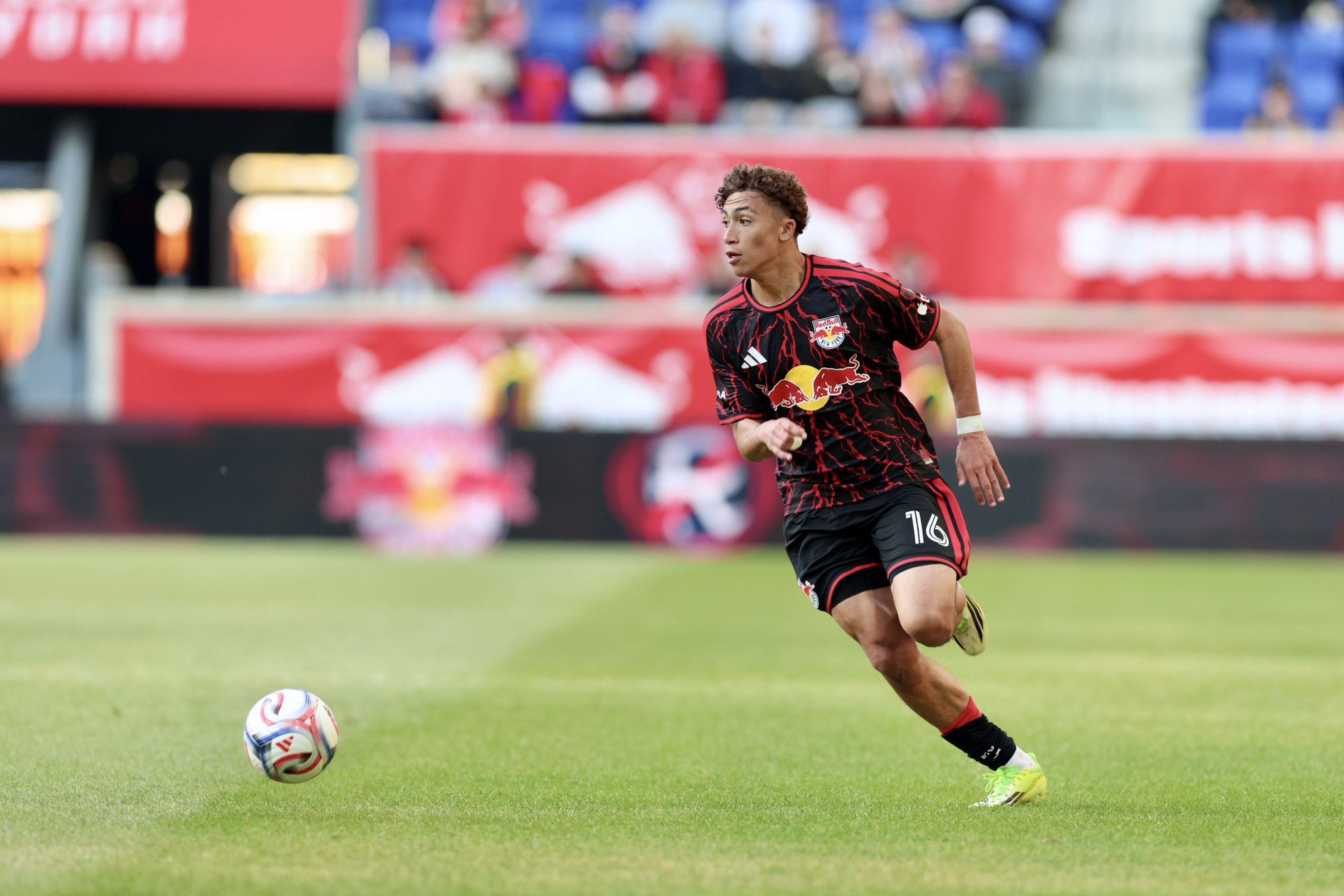 2/18/28, Harrison, New Jersey, Sports Illustrated Stadium. Red Bulls New York forward Julian Zakrzewski (16) moves the ball during a match against the New England Revolution. Mandatory Credit: Jose Pichirilo / Bad Dawg Sports
